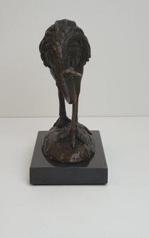 struisvogel van brons op marmer voet