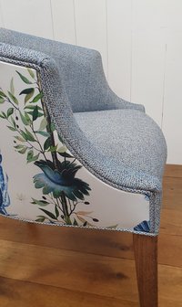 Luxe eetkamerfauteuil met laag ronde rug    model  Kusters