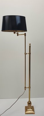 vloerlamp messing met dubbele stang in hoogte verstelbaar en zwenkarm incl. zwarte lak kap ovaal van vorm
