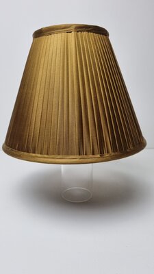 . plooikap in goud
